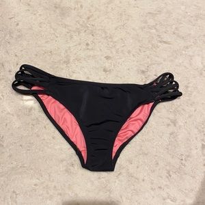 Pink Victoria’s Secret bathing suit bottoms